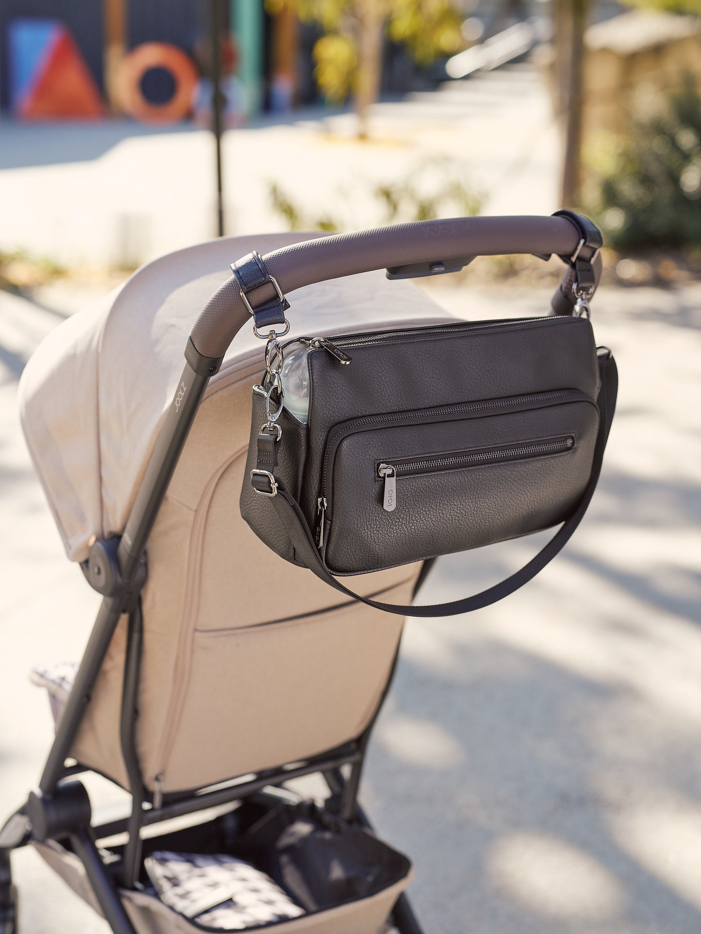 OiOi Multitasker Pram Caddy - Black Vegan